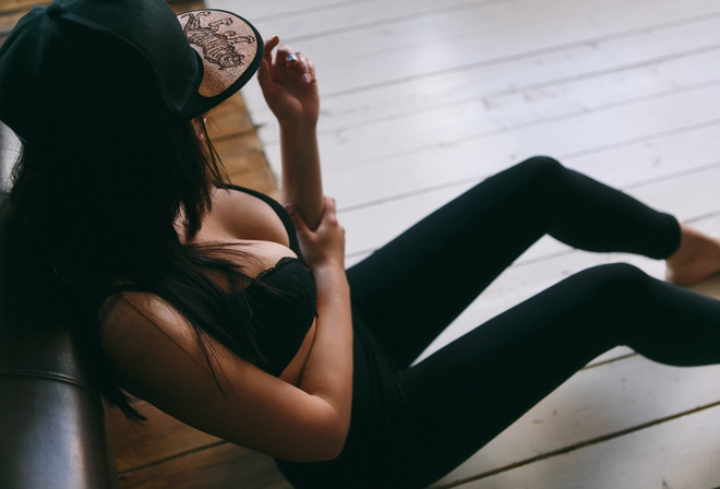 women, tanned, sitting, baseball caps, black bras, yoga pants