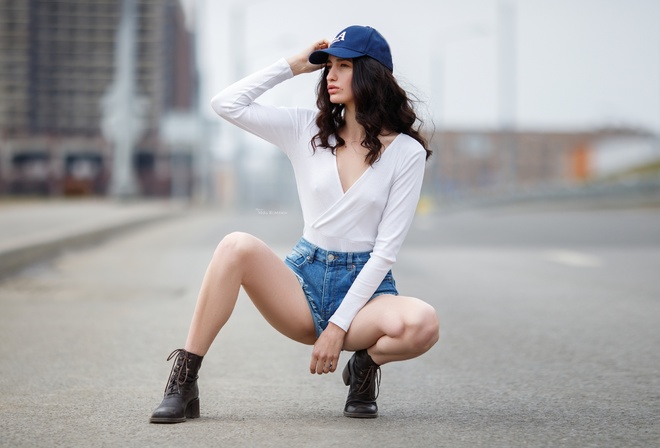 women, squatting, Maksim Romanov, shoes, baseball cap, women outdoors, jean shorts, looking away