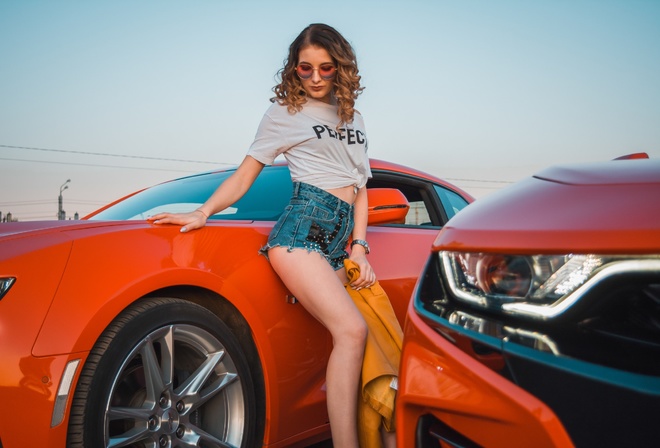 women, women with cars, jean shorts, white t-shirt, watch, women outdoors, curly hair, sky, Chevrolet