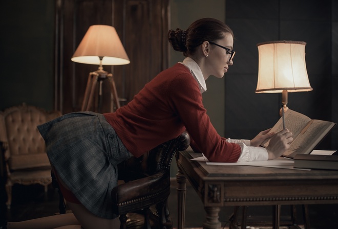 women, lamp, women indoors, skirt, hairbun, chair, garter belt, red sweater, mirror, books, kneeling, women with glasses, reflection