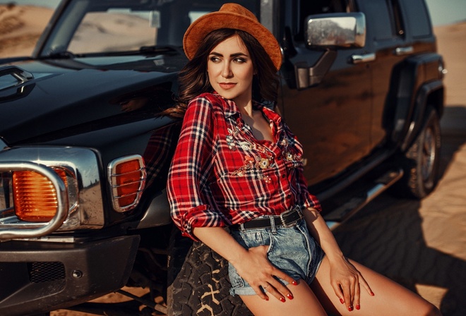 women, hat, women outdoors, sky, clouds, car, desert, plaid shirt, jean shorts, women with cars, red nails, belt, smiling