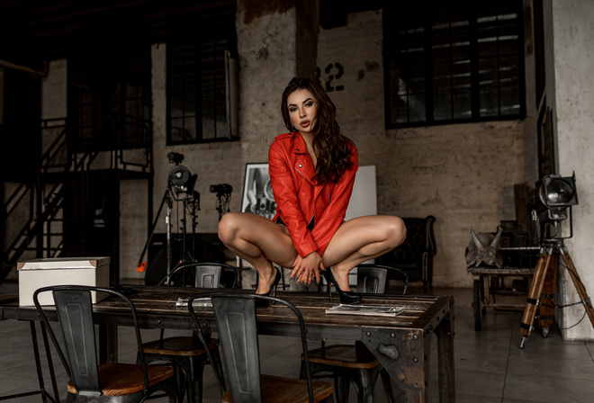 women, squatting, table, chair, leather jackets, red jackets, women indoors, high heels, brunette, stairs, window, strategic covering