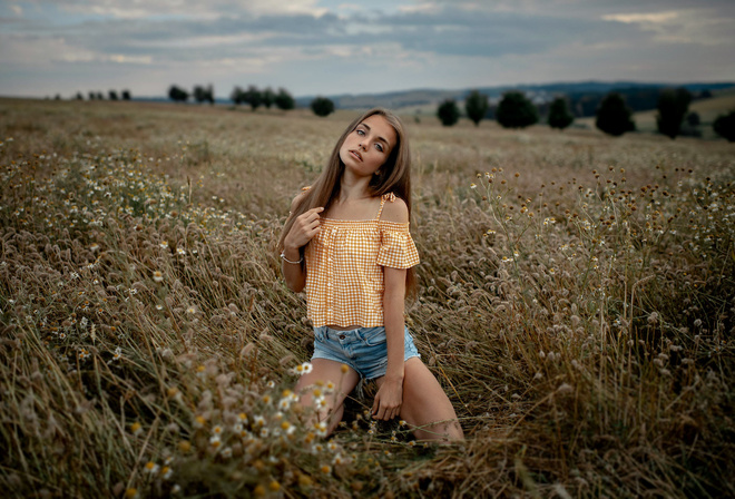 women, kneeling, jean shorts, women outdoors, long hair, skinny, sky, clouds