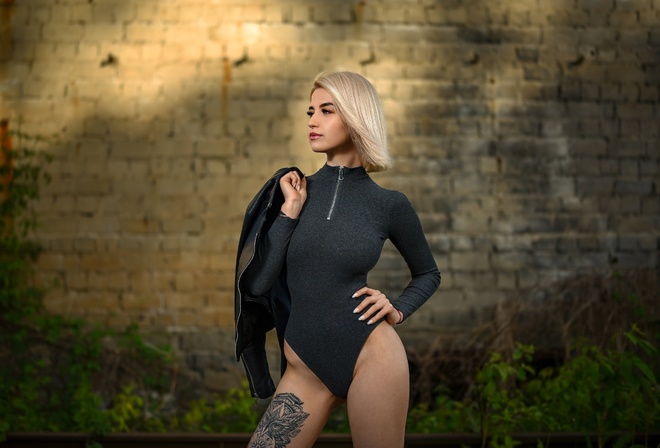 women, blonde, tattoo, black jackets, leather jackets, wall, bricks, red lipstick, hips, women outdoors, zipper, bodysuit