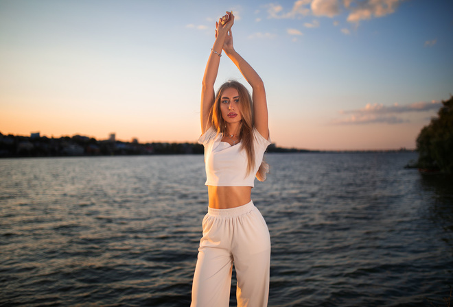 women, blonde, Dmitry Sn, arms up, river, sunset, women outdoors, white clothing, crucifix necklace, blue eyes, sky, clouds