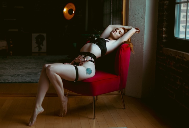 women, model, redhead, women indoors, couch, lingerie, black lingerie, bra, panties, black bra, black panties, tattoo, hips, window, ass, closed eyes, sitting, wooden floor