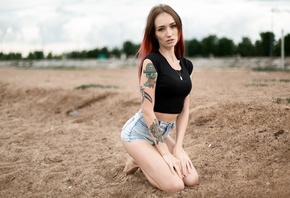 Julia Tyki, women, jean shorts, kneeling, sand, tattoos, skinny, depth of f ...