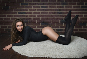 women, tanned, bricks, wall, on the floor, ass, black stockings, leotard, one-piece, smiling, blue eyes, lying on front