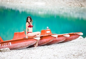 women, sitting, depth of field, red bikinis, sand, water, boat