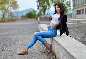 women, sitting, T-shirt, leather clothing, belly, shoes, depth of field, pants, jeans, women outdoors