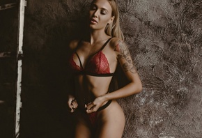 women, blonde, tanned, tattoo, red lingerie, portrait, pierced navel, wall, belly, black nails