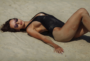 women, tanned, one-piece swimsuit, sand, sunglasses, sideboob, women outdoors, lying on back, sand covered
