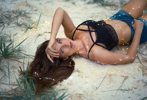 women, tanned, lying on back, jean shorts, pierced navel