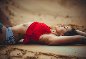 women, short shorts, sand, depth of field, closed eyes, tanned, lying on back, armpits