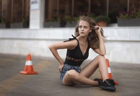 women, tanned, sitting, women outdoors, shoes, jean shorts, on the floor, looking away, depth of field