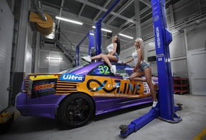 women, Garage, sitting, jean shorts, sneakers, women with cars, blonde, two women, brunette