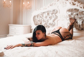 women, in bed, lying on front, ass, tattoo, painted nails, black panties, b ...