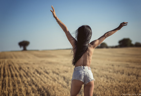 womenj, ean shorts, ass, back, topless, women outdoors, sky, tanned, long hair, arms up