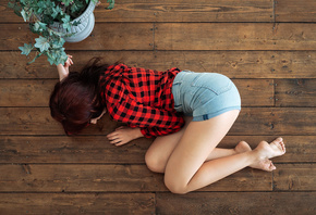 women, plaid shirt, brunette, jean shorts, on the floor, top view, wooden surface, plants