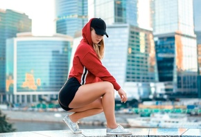 women, blonde, sweater, building, squatting, baseball cap, ass, sneakers, hoods