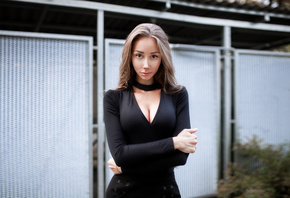 women, arms crossed, black clothing, portrait