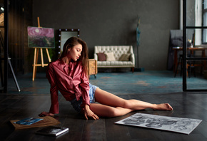 women, jean shorts, easel, sitting, on the floor, painting, shirt, painted nails