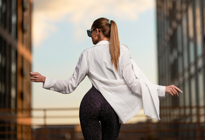 women, back, brunette, sunglasses, women outdoors, white shirt, leggings, building, fence