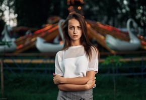 women, face, portrait, women outdoors, painted nails, arms crossed, carousel