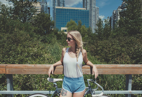 Casy Lynn, women, blonde, women with bicycles, sportswear, high waist shorts, sunglasses, ponytail, women outdoors, brunette, tattoo, looking away, building, fence