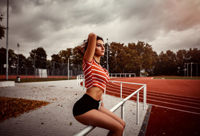 women, sitting, high waisted short, ass, trees, women outdoors, crop top, looking away, leaves, fence, belly, clouds, sky