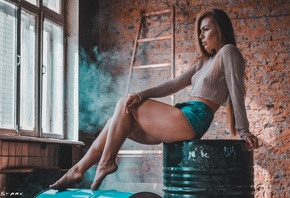 Anna Grace, sitting, brunette, window, jean shorts, smoke, wall, bricks, barrels, nipples through clothing, looking away, ladders, women