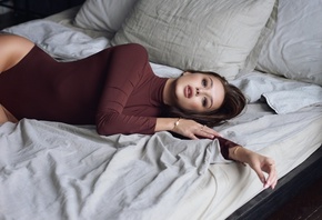 women, brunette, leotard, pillow, pierced nose, in bed, pink nails, ribs, brown eyes, pink lipstick, hips