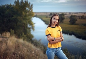 women, yellow t-shirt, river, nature, jeans, watch, arms crossed, sky, women outdoors, smiling