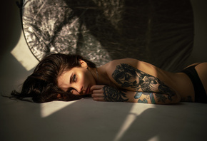 women, Studio, tattoo, brunette, women indoors, black panties, skinny, ass, lying on front, eyeliner, ribs, shadow, topless