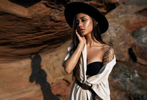 women, brunette, tattoo, women outdoors, hat, belt, white dress, black bras, long hair, rocks, portrait