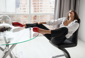 model, brunette, pants, Red shoes, high heels, office, chair, suspenders, window, sitting, glass table, grapes, makeup
