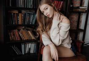 women, Andrey Popenko, books, sitting, women indoors, jean shorts, sweater, chair, eyeliner