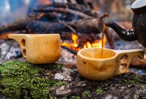 wooden finnish mug, camp fire, coffee