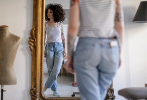 Ladies Jeans, tattoos, mirror