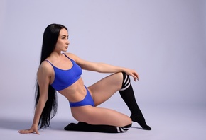 brunette, model, women, studio, blue tops, sports bra, fitness model, blue panties, women indoors, white background, simple background, ass, hips, long hair, black socks, striped socks