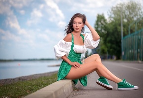 Sergey Gokk, women, model, brunette, women outdoors, sky, clouds, trees, sitting, Converse, sneakers, green sneakers, lake, legs