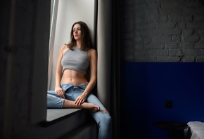 , Disha Shemetova, model, by the window, women indoors, brunette, jeans, tank top, open jeans, torn jeans, bed, red lipstick, sitting, barefoot, belly butoon, women