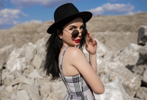 red lipstick, brunette, , women outdoors, sky, clouds, women with glasses, model, women with shades, rocks, dress, black hat