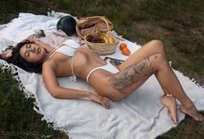 Evgeniy Krestyanov, ass, hips, picnic, white bikini, baskets, tattoo, women outdoors, women, model, brunette, grass, grapes, bananas, closed eyes