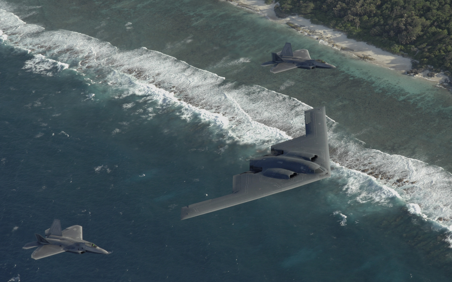 Two f22, b-2, pacific ocean