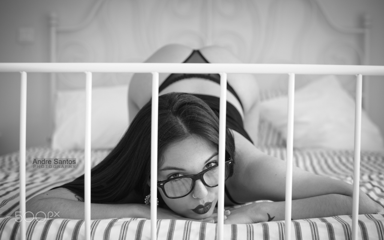 women, portrait, bent over, ass, in bed, women with glasses, glasses, panties, lingerie, tattoo, looking at viewer, monochrome, nose rings, andre santos