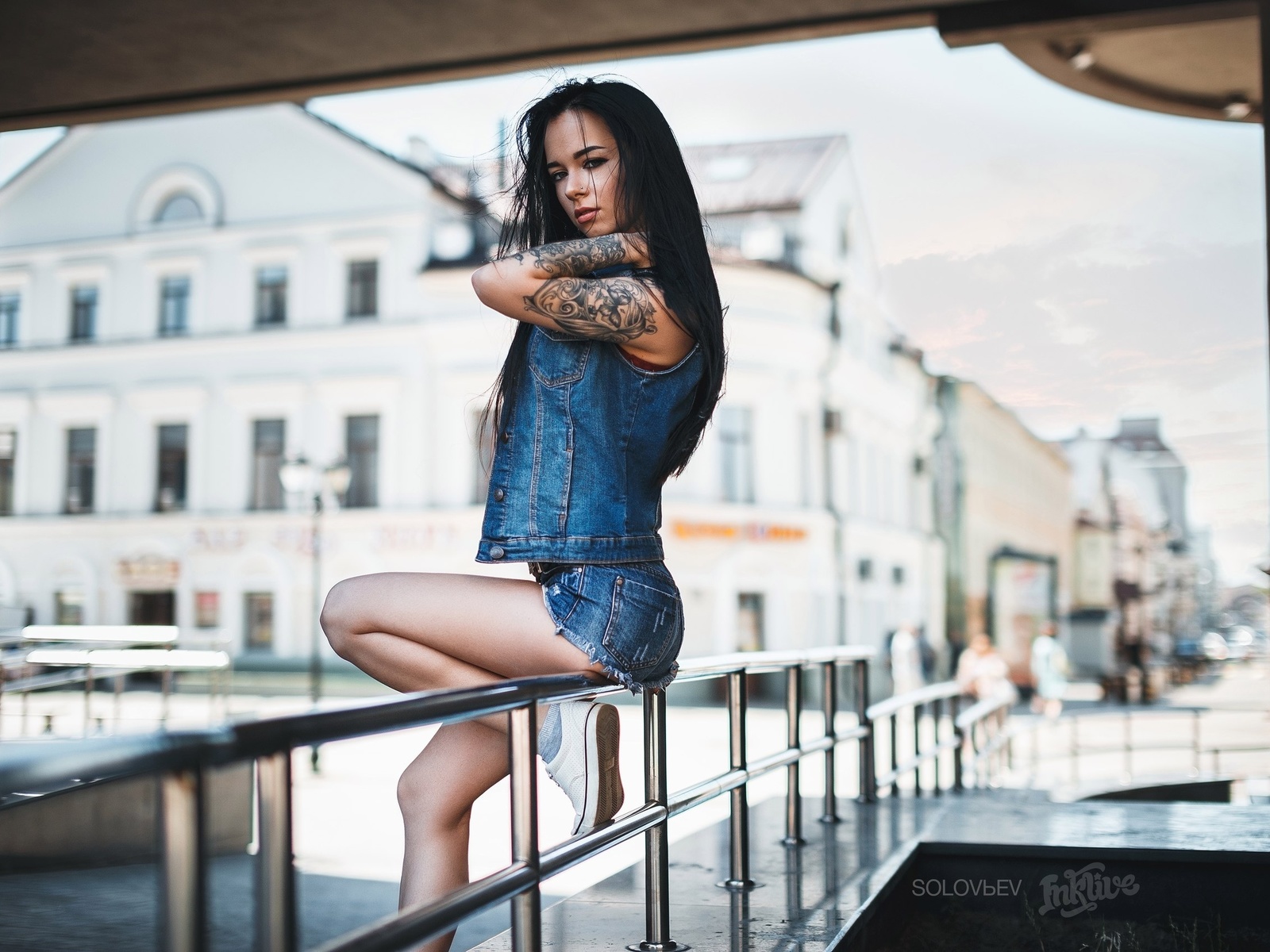 anastasia rozhdestvenskay, women, model, black hair, ass, sitting, jean shorts, skinny, long hair, denim, tattoos, portrait, looking at viewer, sneakers, sensual gaze, pierced nose, , artem solovev