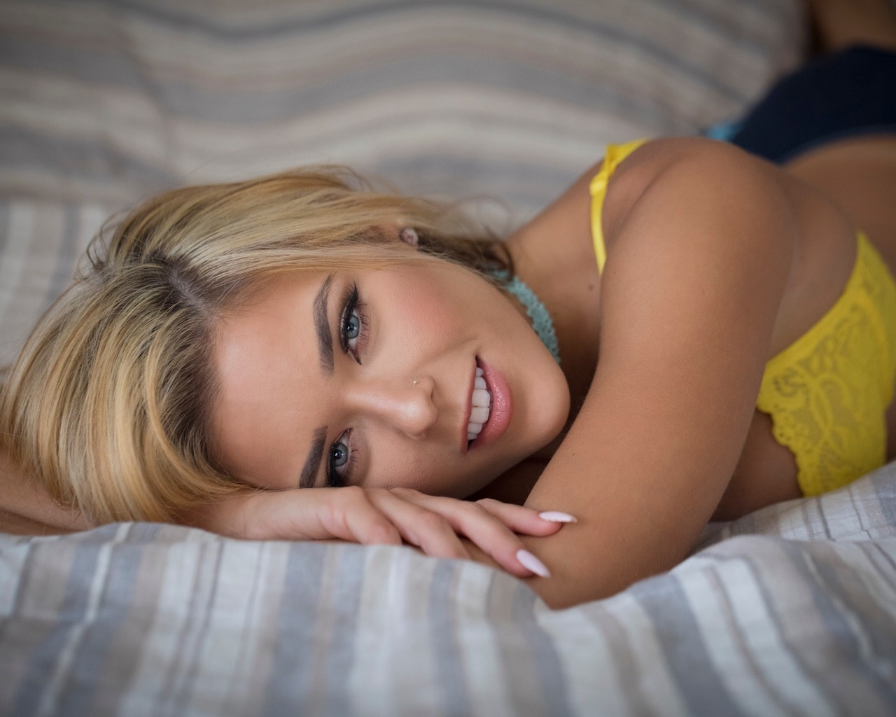 neesy rizzo, women, blonde, smiling, lying on front, in bed, yellow bra, lingerie, tanned, pierced nose, gray eyes, choker, , , , ,   ,  ,  ,  ,  , 