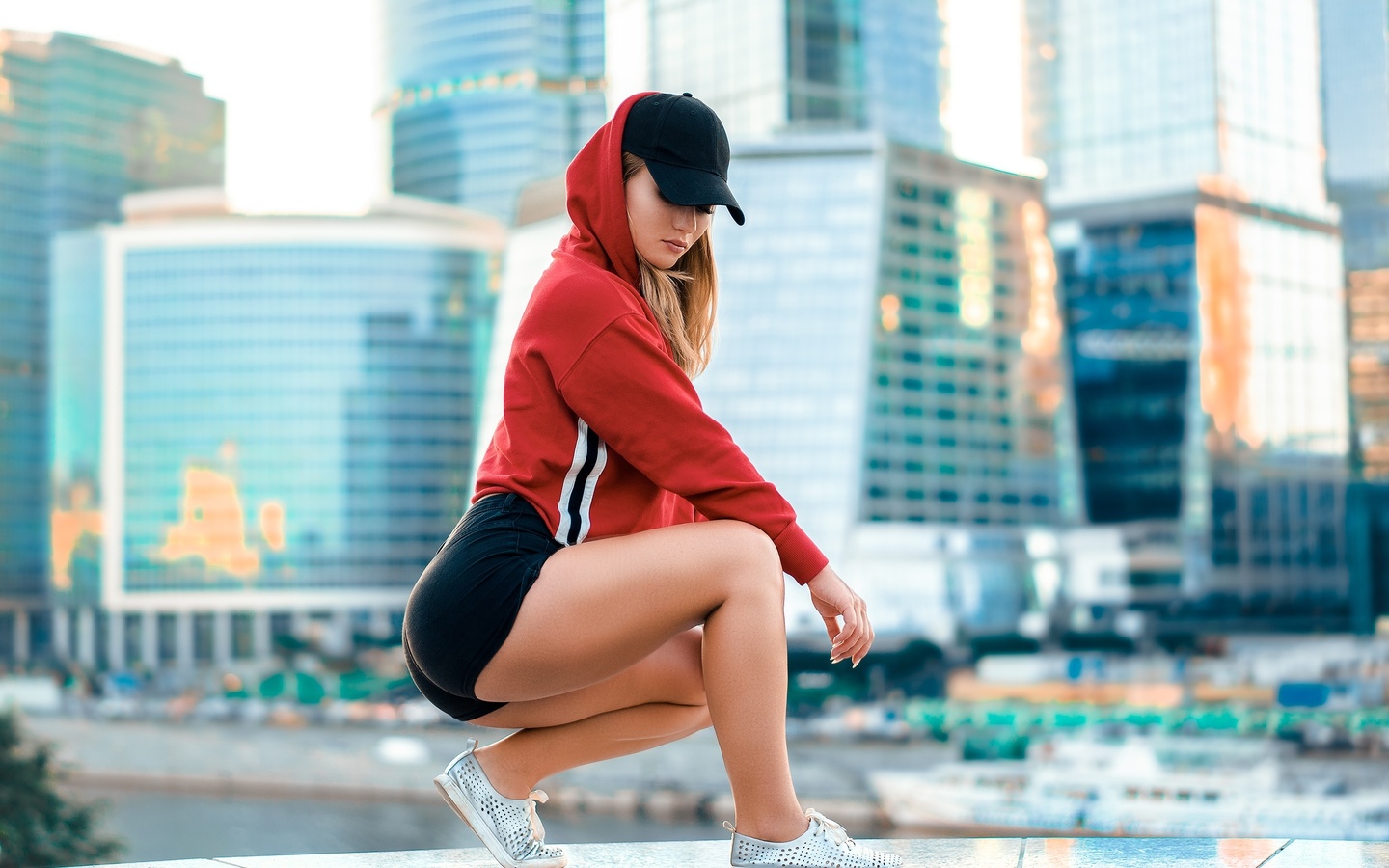 women, blonde, sweater, building, squatting, baseball cap, ass, sneakers, hoods