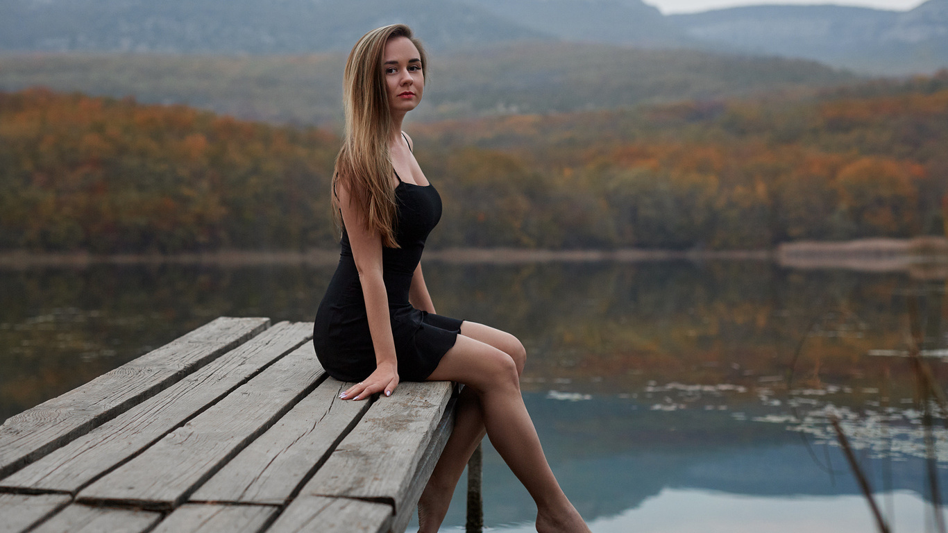 blonde, women, black dress, women outdoors, sitting, lake, portrait